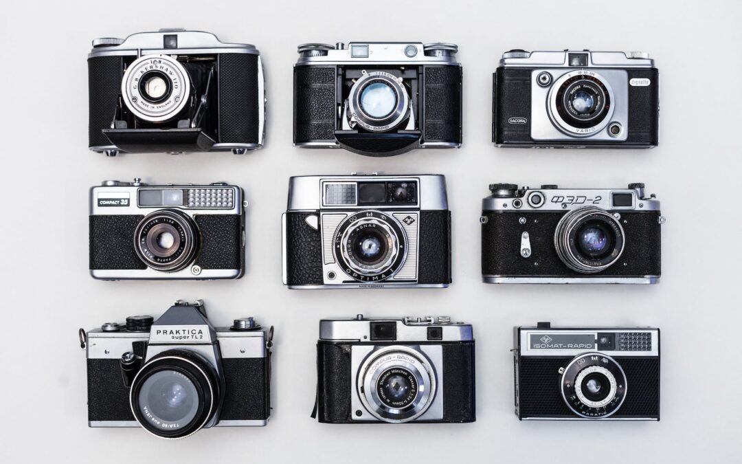 nine black and gray cameras