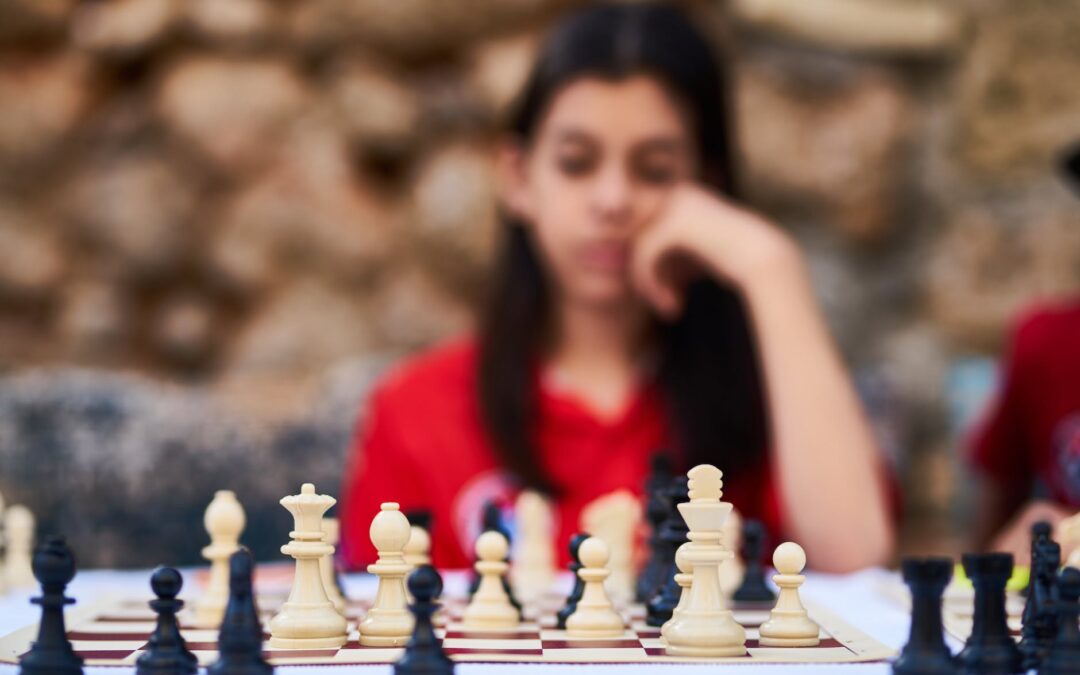 woman playing chess