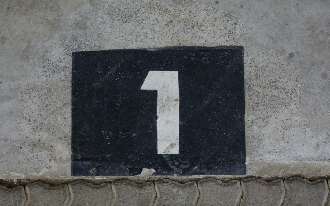 sign with house number on wall