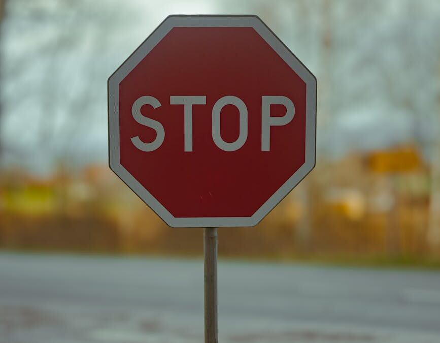 close up of a road stop sign in spring